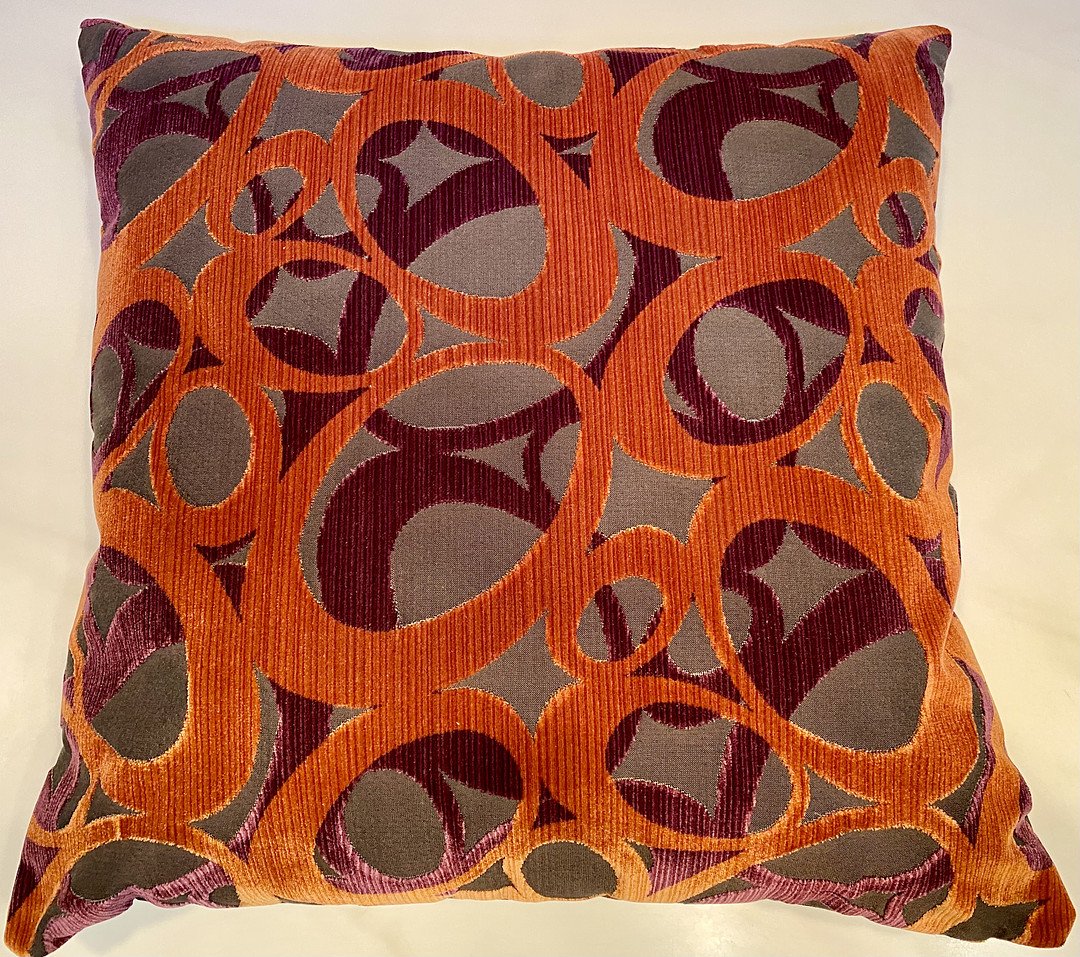 Luxury Pillow 24 x 24 Barbarella a raised velvet circular design in bright orange and purple over a smooth silver gray background on both sides