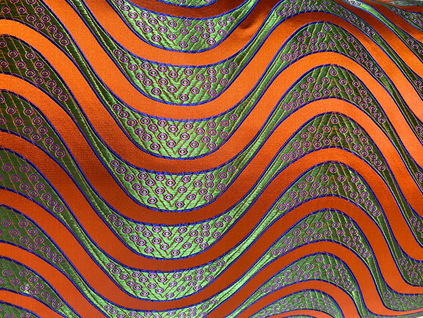 Luxury Lumbar Pillow; 24" x 14" - Swell, bright orange wavey stripes over a pearlized green background all in a glamorous shiny fabric