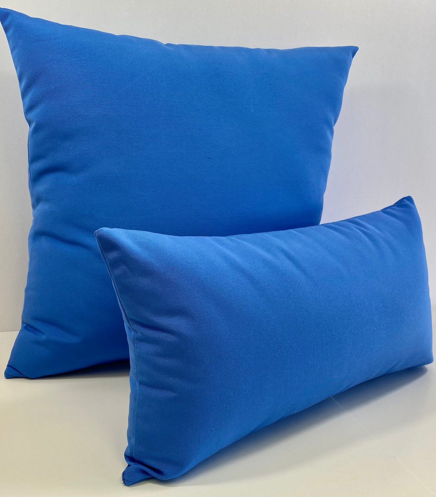 Luxury Outdoor Lumbar Pillow - 22" x 12" - Cayman-Blue Solid