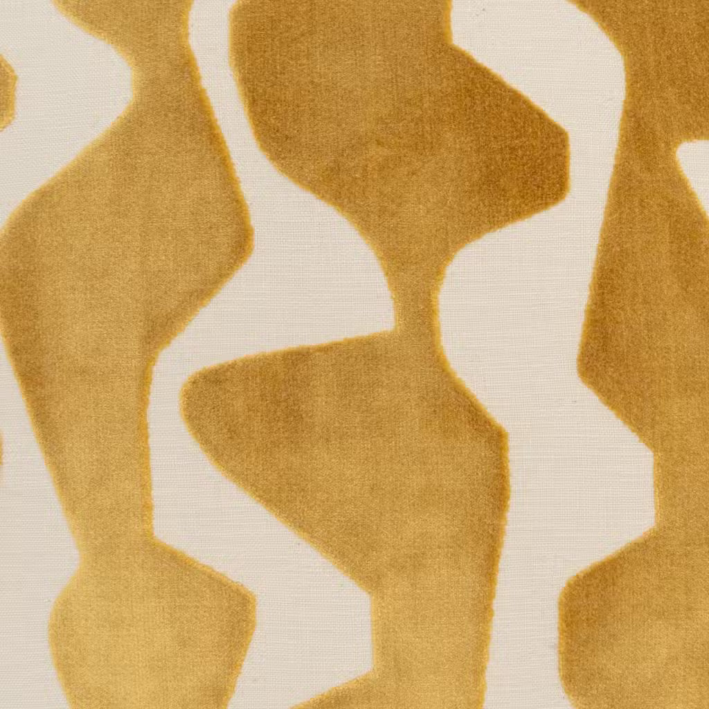 A close-up of a textured fabric or wallpaper pattern featuring organic, wavy abstract shapes in a warm mustard yellow over an off-white background.