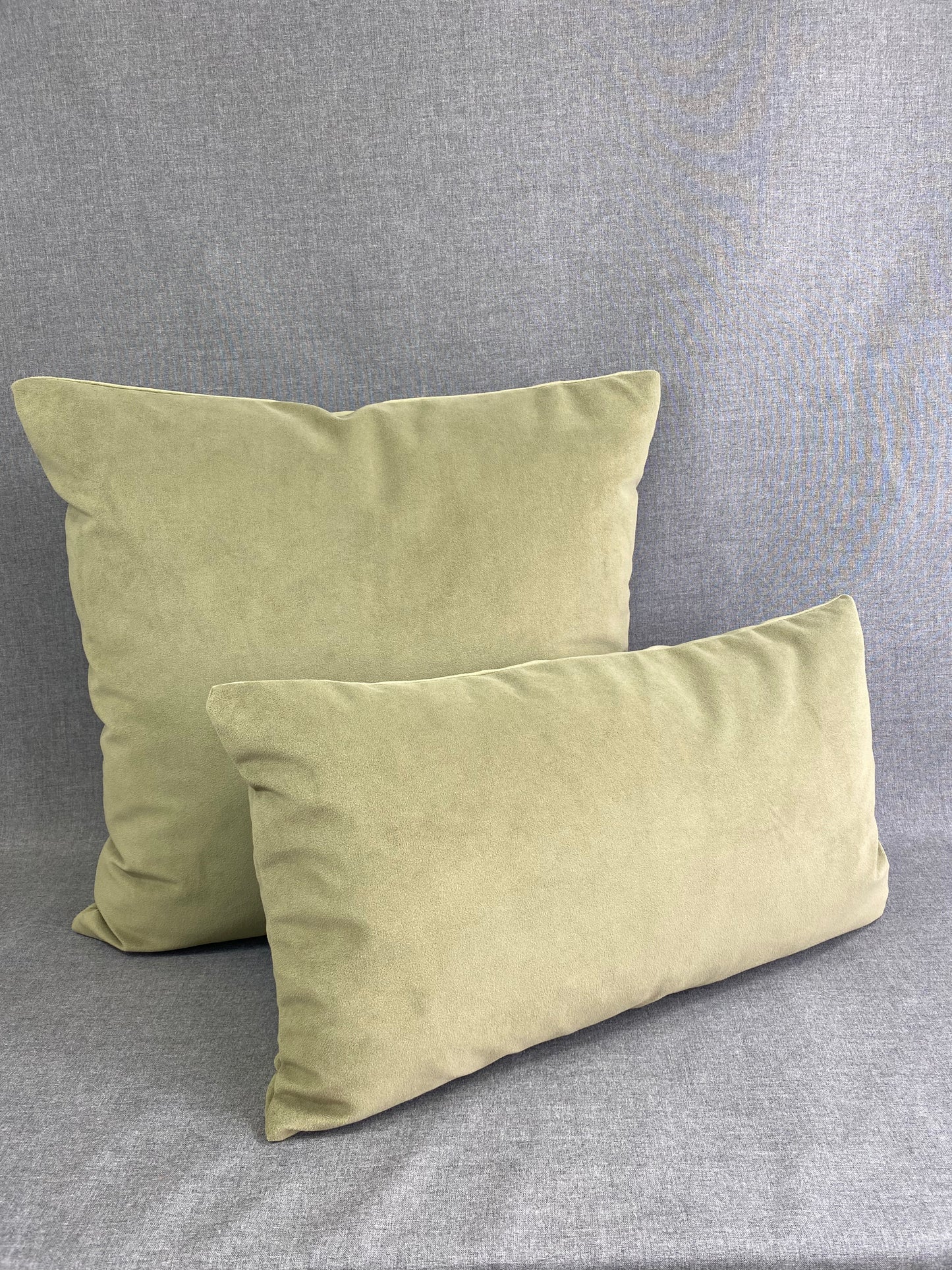 Belvedere Sage Lumbar; Jewel Green solid in a creamy smooth velvet fabric.