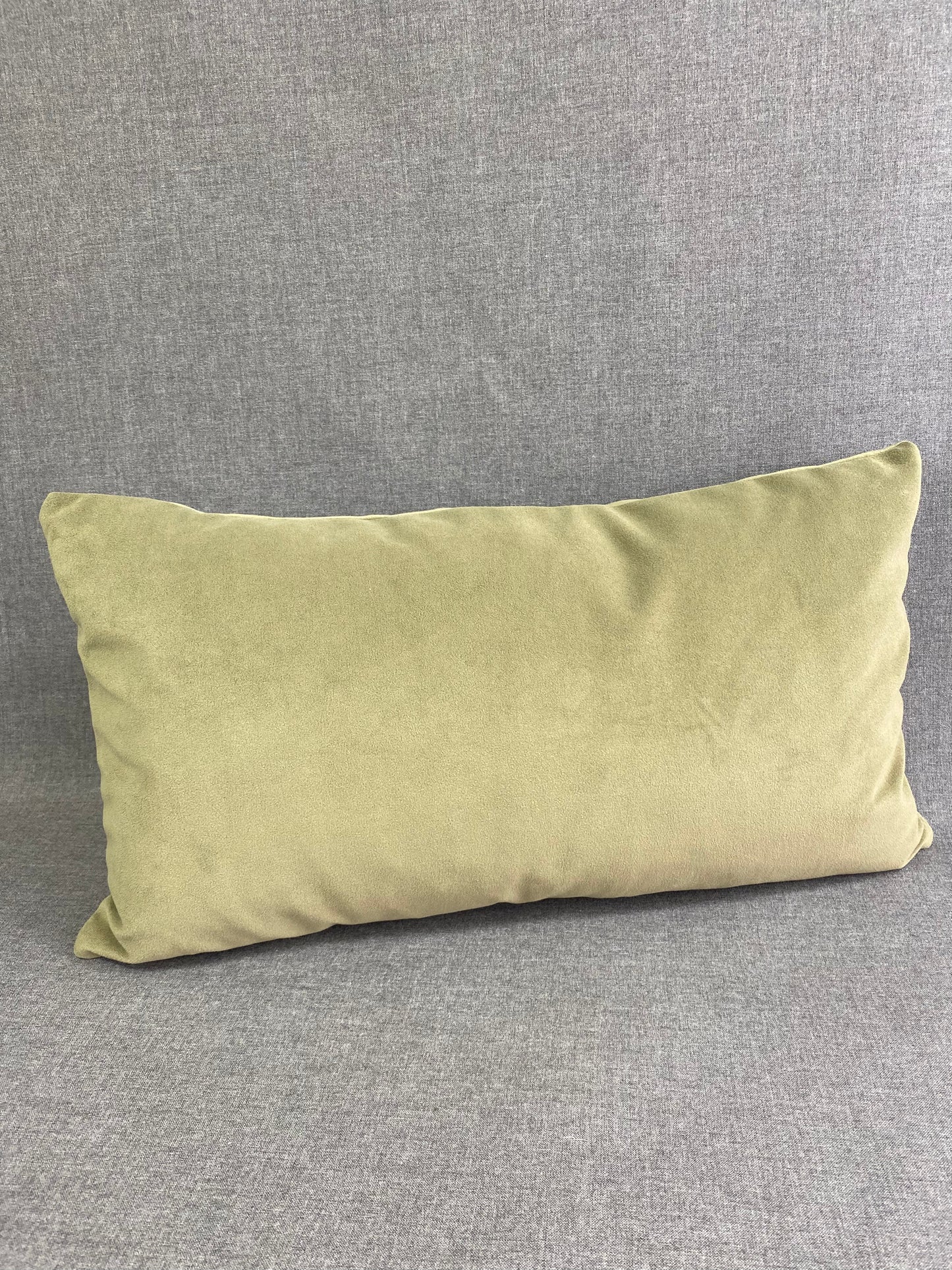 Belvedere Sage Lumbar; Jewel Green solid in a creamy smooth velvet fabric.