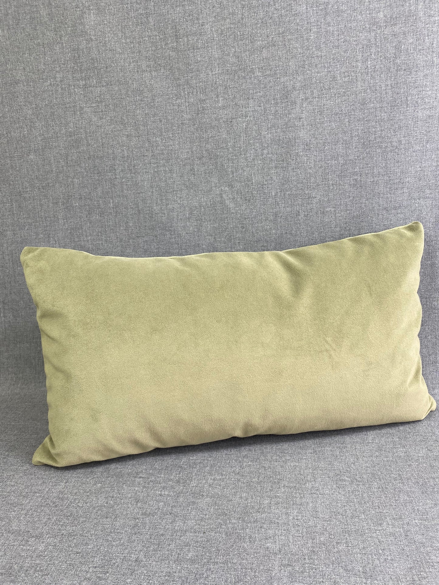 Belvedere Sage Lumbar; Jewel Green solid in a creamy smooth velvet fabric.