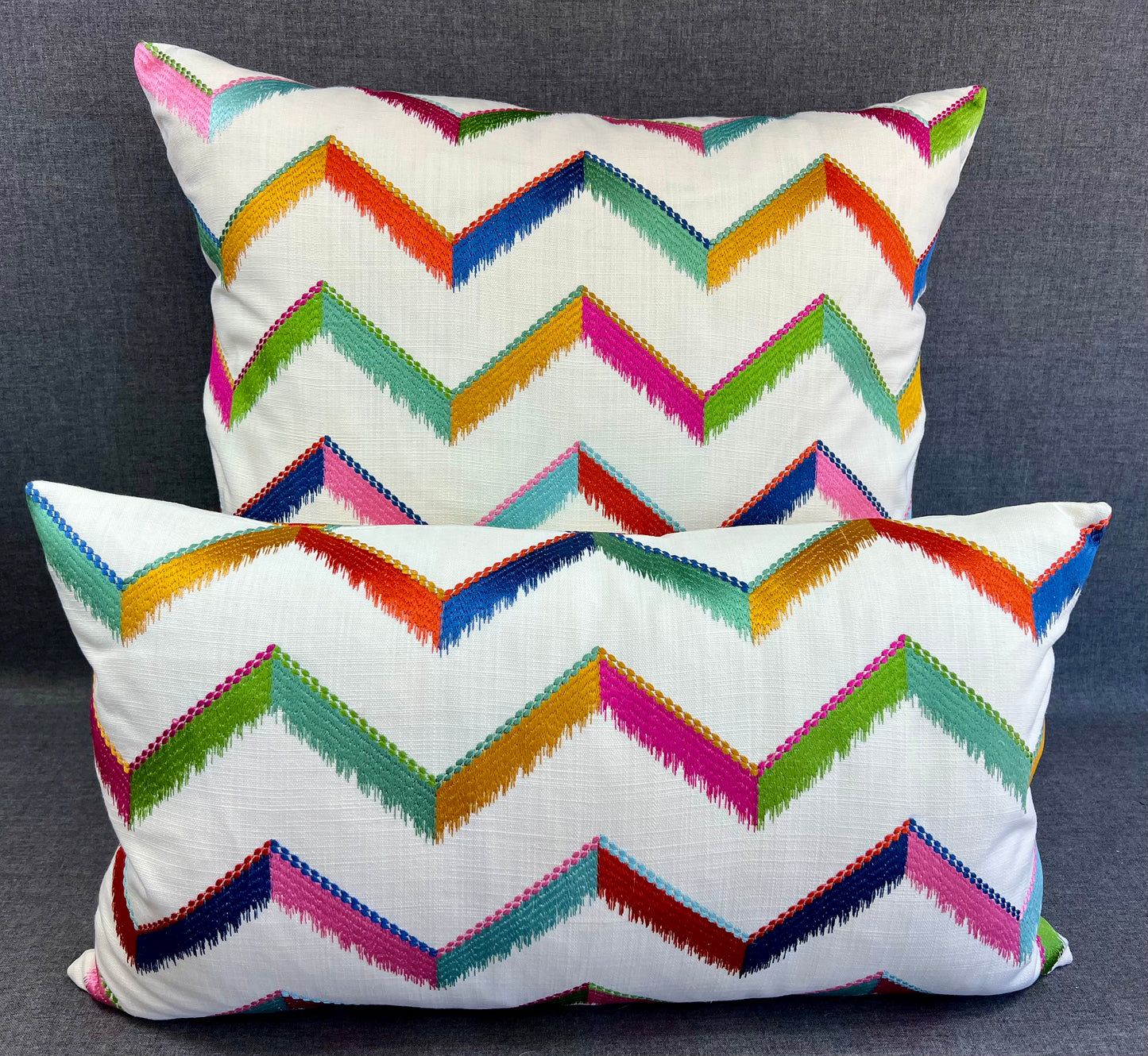 Luxury Lumbar Pillow - 24" x 14" - Chevron Confetti; Bright embroidered chevrons of pinks, greens blues, golds and oranges on a white linen textured background.