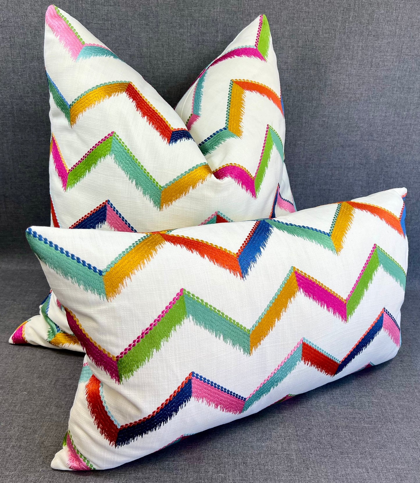 Luxury Lumbar Pillow - 24" x 14" - Chevron Confetti; Bright embroidered chevrons of pinks, greens blues, golds and oranges on a white linen textured background.