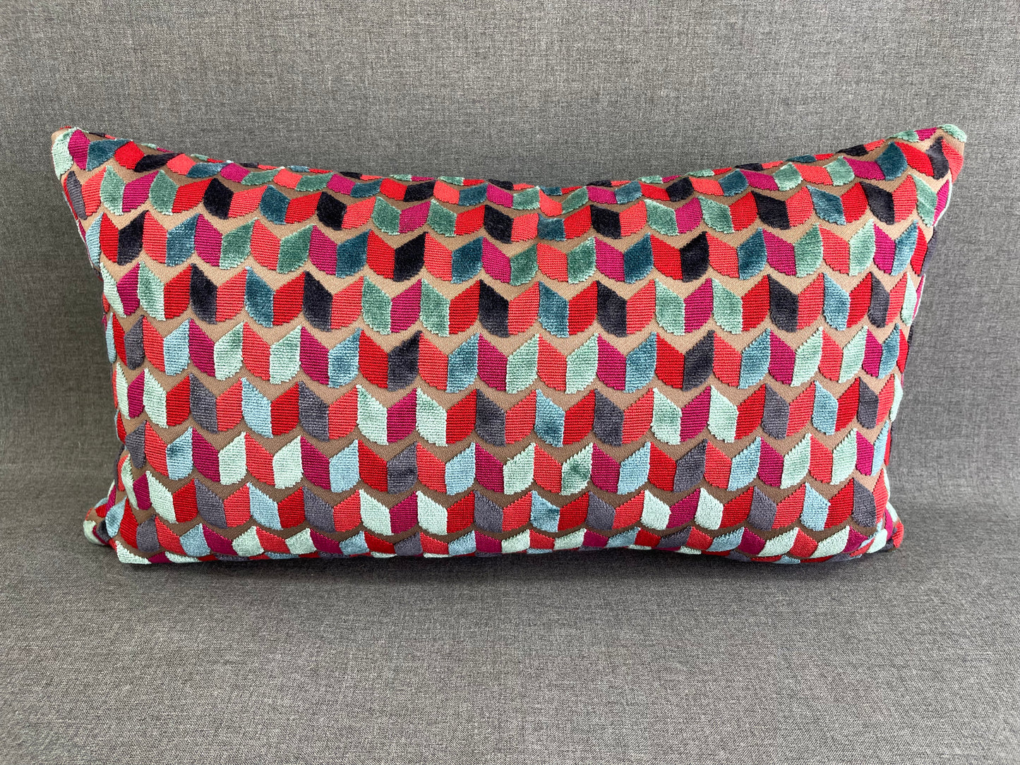 Luxury Lumbar Pillow 24" x 14" - Court Jester; Bright Green, Red, Blue in a geometric cut velvet pattern