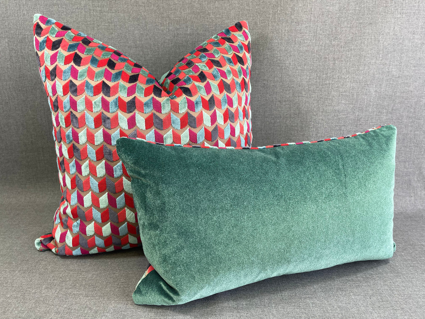 Luxury Lumbar Pillow 24" x 14" - Court Jester; Bright Green, Red, Blue in a geometric cut velvet pattern