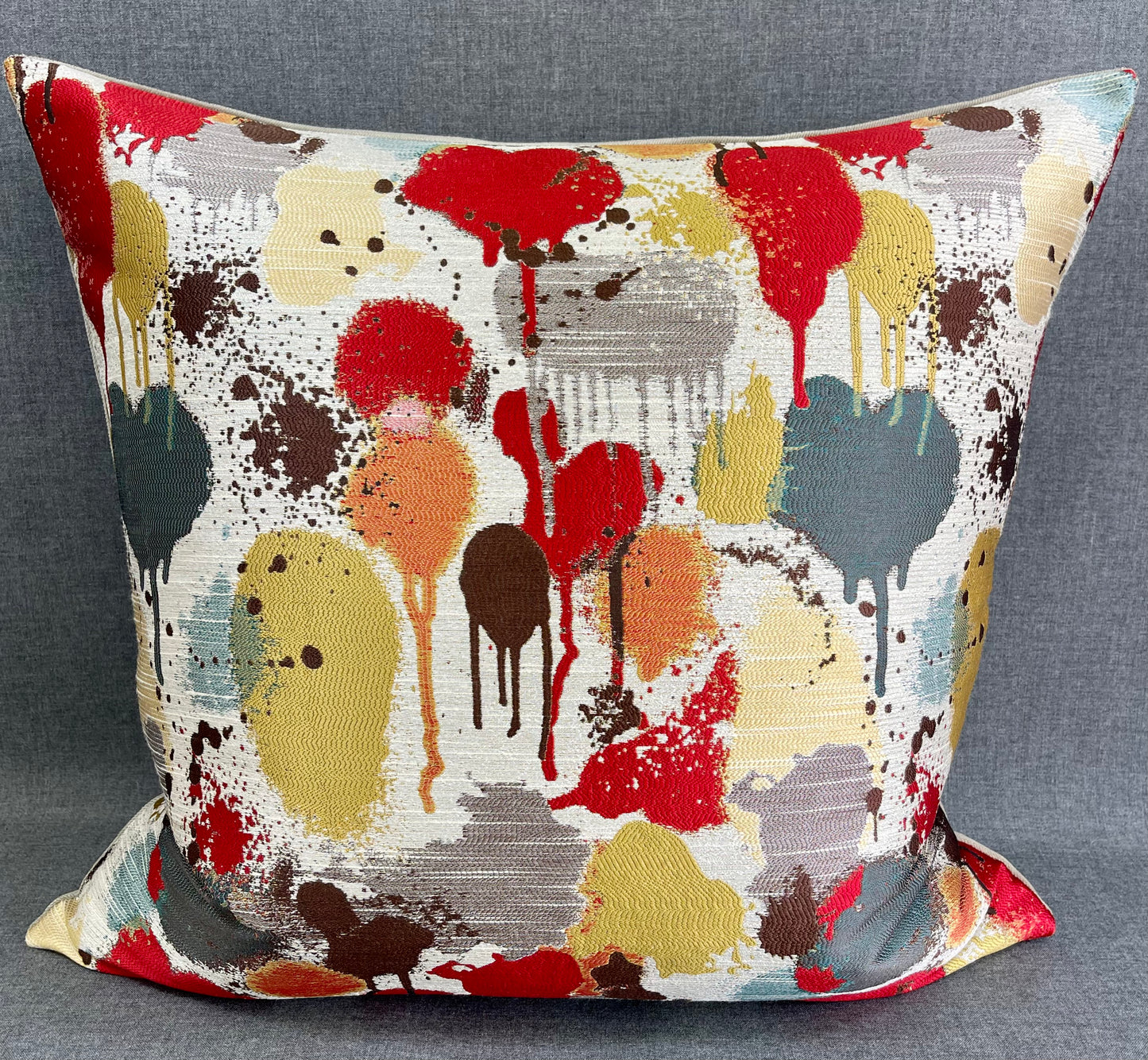 Luxury Pillow - 24” x 24” - Funfetti Red/Taupe; Bright red, green, teal, bronze and yellow spots on a cream background and with a cream back