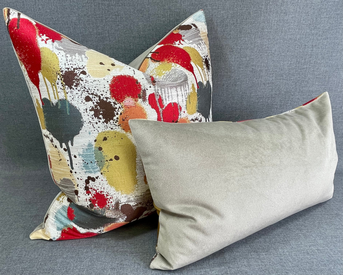 Luxury Pillow - 24” x 24” - Funfetti Red/Taupe; Bright red, green, teal, bronze and yellow spots on a cream background and with a cream back