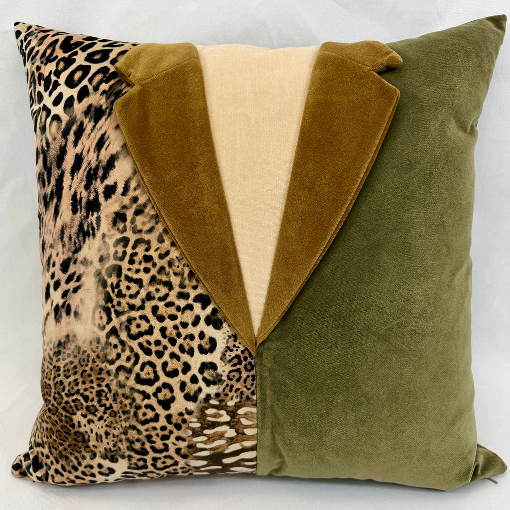 A square decorative throw pillow featuring a split design: one half is olive green velvet, the other half is beige leopard print fabric, and the center forms a large V shape made of olive green velvet and tan velvet.