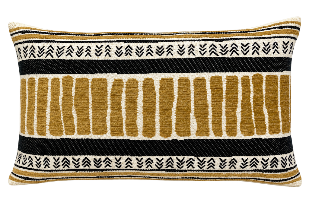 A rectangular woven throw pillow with a Southwestern-style geometric pattern in mustard yellow, black, and cream.