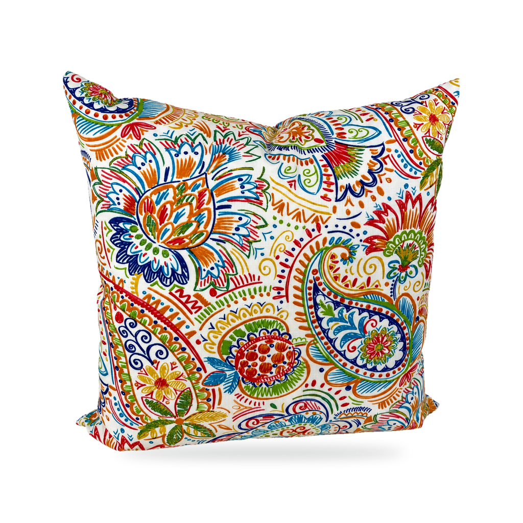 A square decorative throw pillow featuring a vibrant, multicolored paisley and floral pattern on a cream background, isolated on a white studio background.