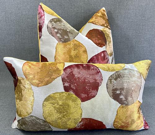 Luxury Pillow -  24" x 24" - Balloons: A fun pattern of red, yellow, orange and chartreuse circles on an ivory background