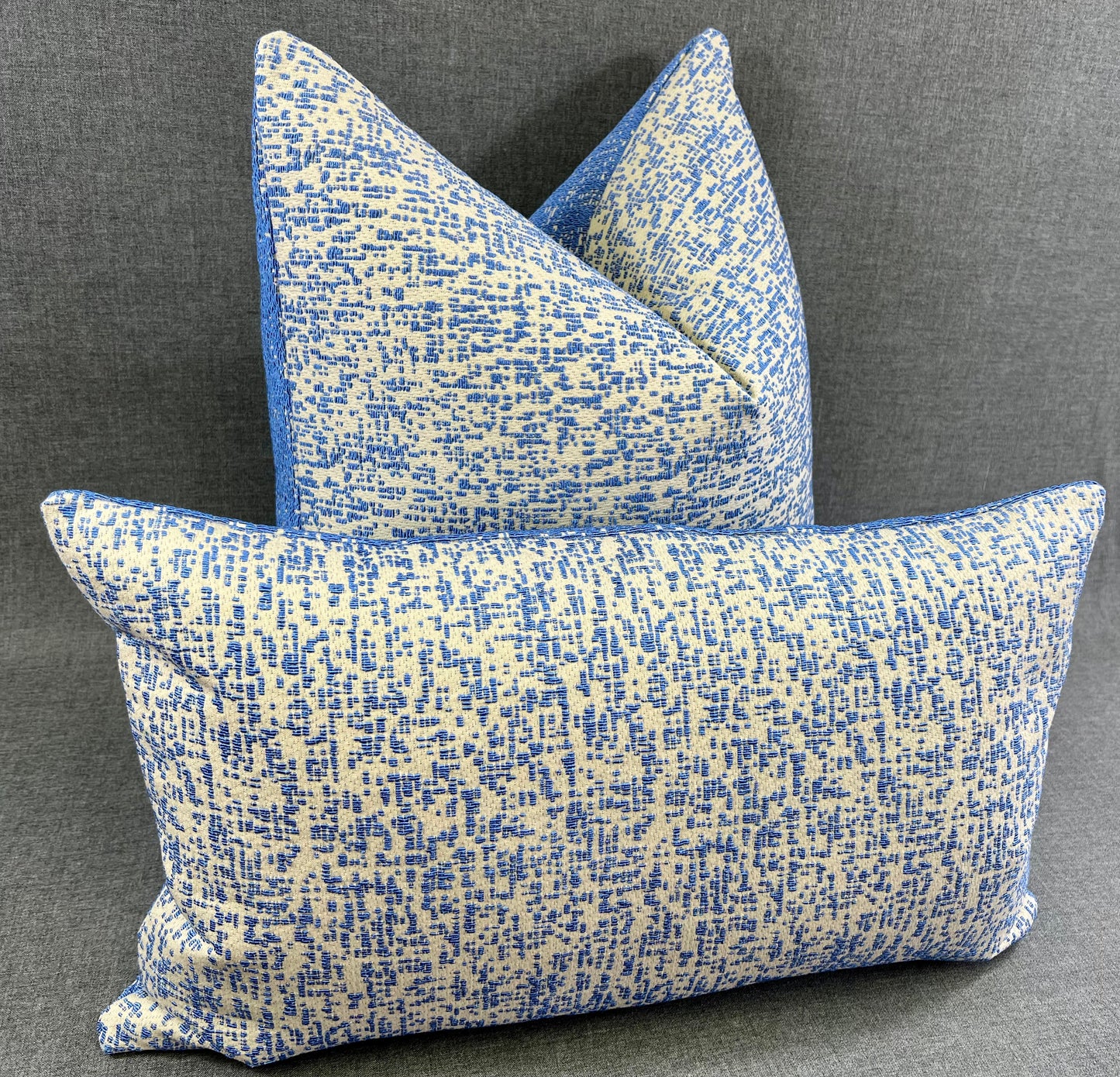 Luxury Pillow - 24" x 14" - Summer Sky Lumbar-Blue; Bright blue textured fabric over a cream background with the back a cream texture over a blue background