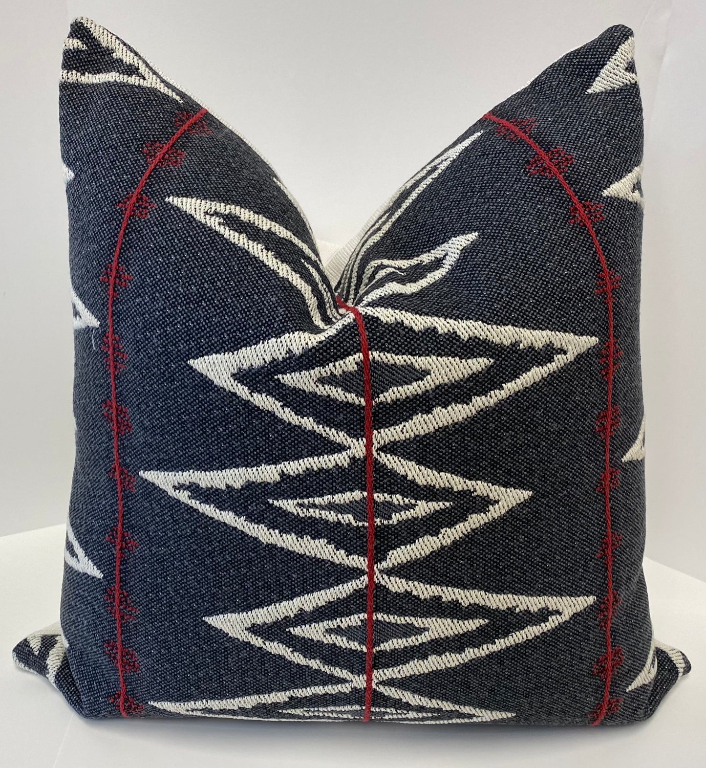 Luxury Pillow - 24" x 24" - Arrow; Deep blue black woven background with a white and red woven design